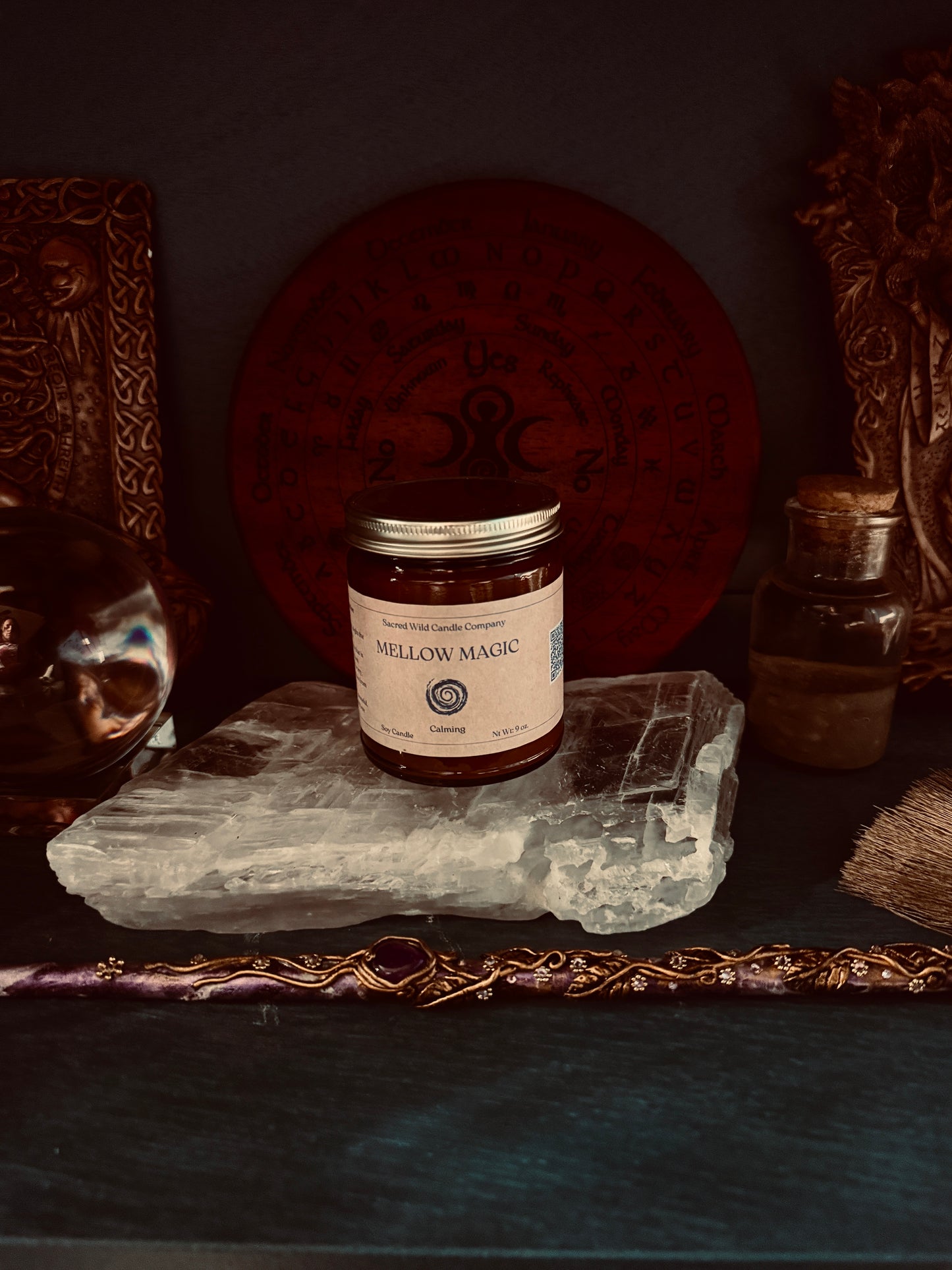 Jar labeled 'Mellow Magic' on a stone surface with decorative background